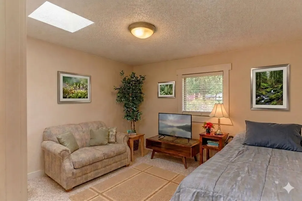 A resident's bedroom with a window over the garden