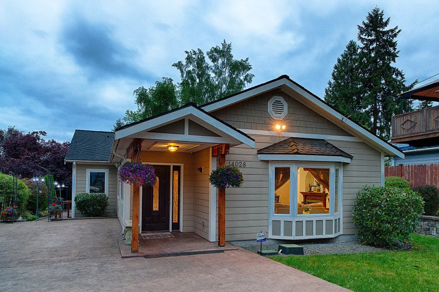The 19th Ave NE home in Seattle at dusk